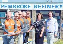 3 Peaks Challengers thank refinery for charity support
