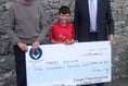 Cheque boost for young cricketer Harry