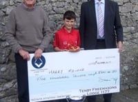 Cheque boost for young cricketer Harry