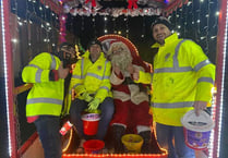 Santa's tour continues with Round Table's little helpers!