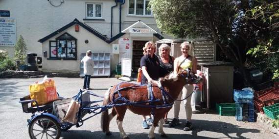 Hot-to-trot Bella delivers smiles and goods to villagers