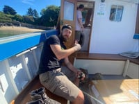 ‘Inspirational’ charity walker Josh visits Tenby and Caldey