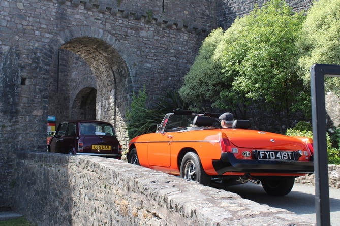 Classic cars entering the castle at Pembroke