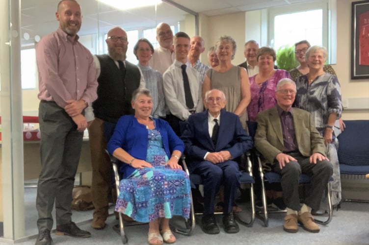 The celebrated Trustees with some of the current trustees and members of the PLANED team, pictured at the installation of the new clock on the exterior of the building to mark their time.