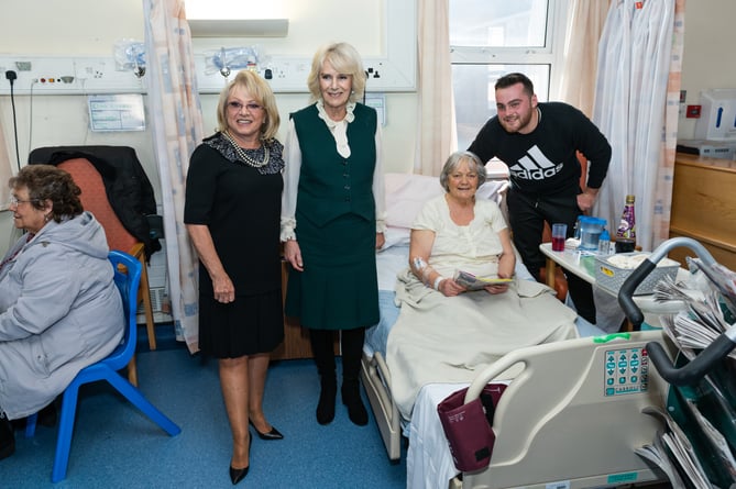 Her Majesty the Queen Consort and Elaine Paige at hospital trolley