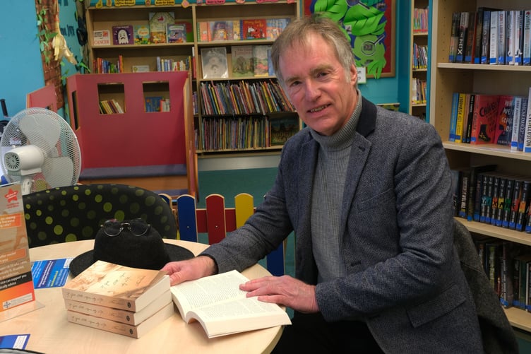 Author Mike Lewis with copies of his novel If God Will Spare My Life