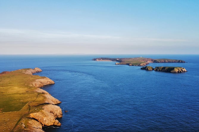 Giltar Point, Caldey and St Margarets Islands basking in the April setting sun