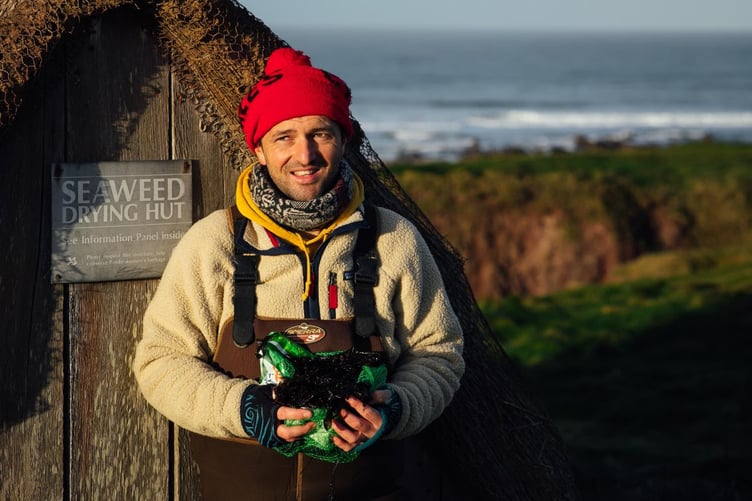 Jonathan Williams, founder of National Laverbread Day, pictured by the seaweed drying hut at Freshwater West, Pembrokeshire