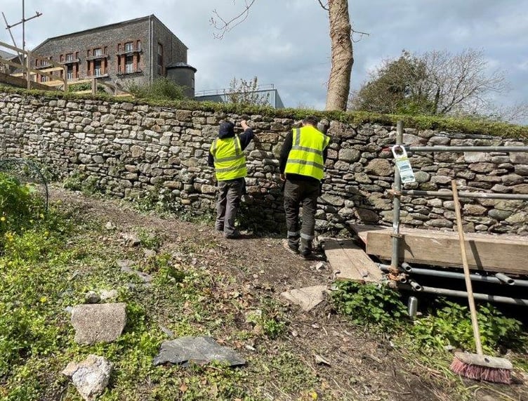 Recent Heritage building skills, regenerating and turf capping stone walls alongside the Millpond Walk Pembroke.