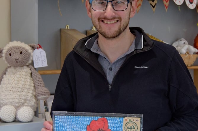 Gethin, One of the Station Shop makers with his artwork