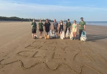 Folly Farm team cleans up Tenby South Beach for World Refill Day