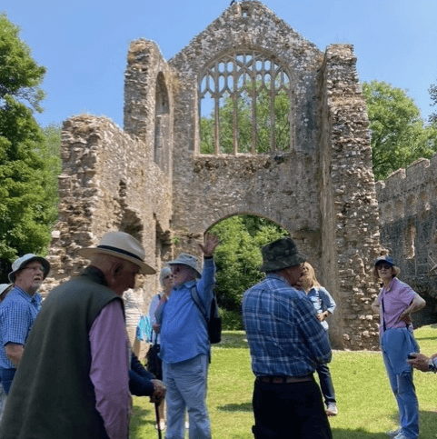 Terry John explaining the secrets of Lamphey Palace to the Pembrokeshire National Trust Association