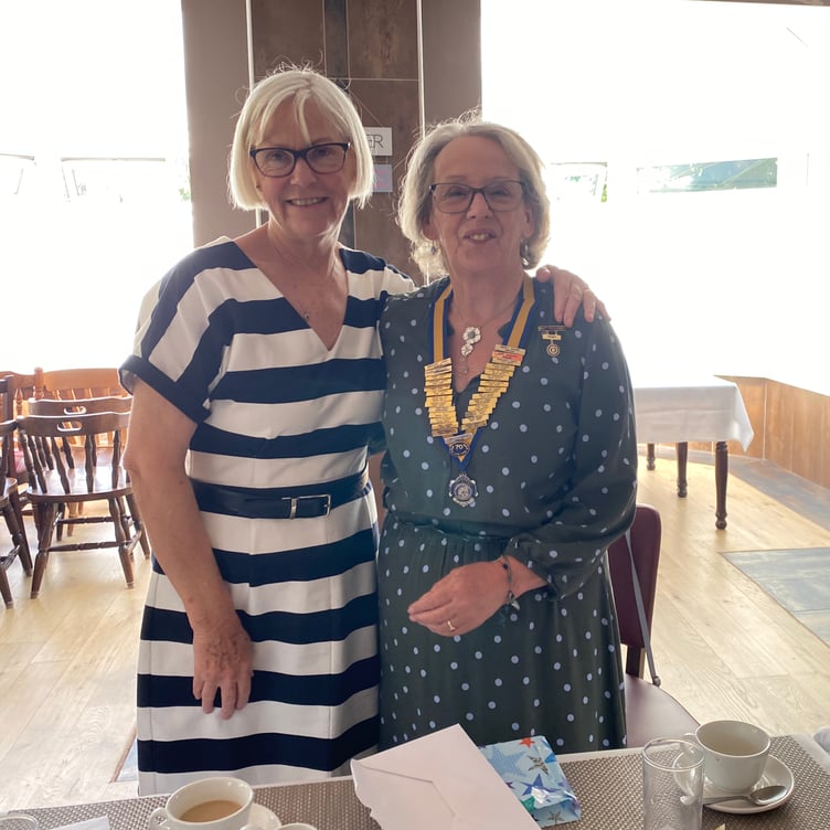 Val presents Maggie with the Tenby and District Inner Wheel president's chain of office