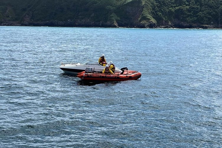 Little Haven D Class pictured with the broken down speedboat Credit: RNLI St Davids