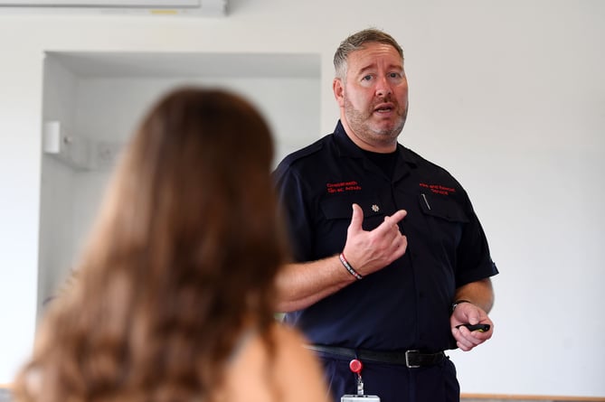 Fire and Rescue Officer presenting at an educational course