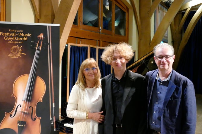 Seen here with his Polish mother and Welsh father, UK-born Adam Jackson began his piano studies at the age of 7 after his family moved from Dubai to the United States. 