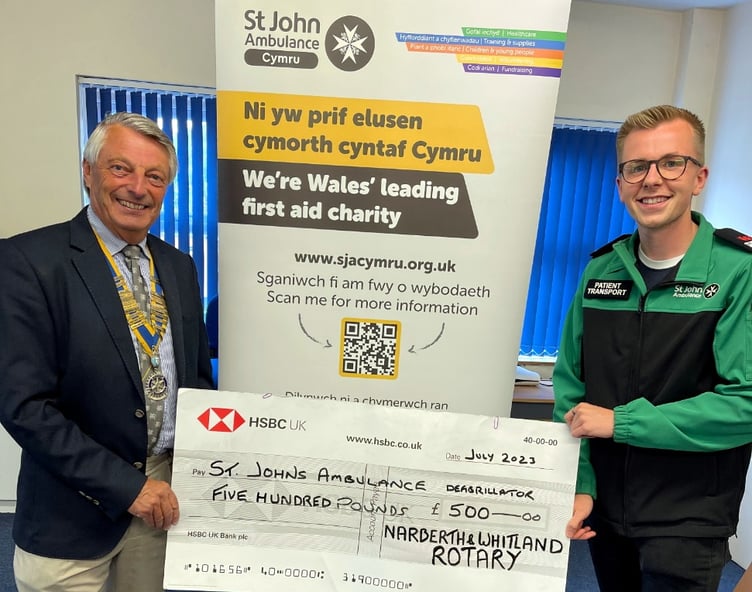 The Narberth and Whitland Rotary Club has recently donated a generous £500 towards a new defibrillator. Pictured are Phil Thompson, Narberth and Whitland Rotary Club President and James Cordell, volunteer at St John Ambulance Cymru.