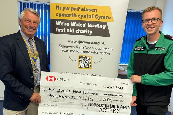 The Narberth and Whitland Rotary Club has recently donated a generous £500 towards a new defibrillator. Pictured are Phil Thompson, Narberth and Whitland Rotary Club President and James Cordell, volunteer at St John Ambulance Cymru.