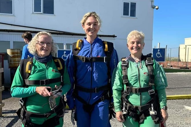 Sunderland Ward staff members Tracy George, Sister; Rebecca Richards, Senior Sister and Denise Davies, Discharge Liaison Nurse at Skydive Swansea
