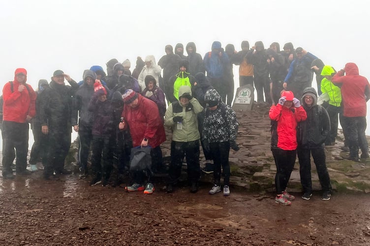Ashmole & Co staff on the top of Pen y Fan