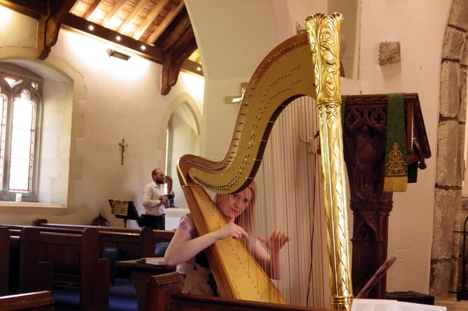 Clair Jones with her golden harp