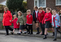 Families take to their feet this International Walk to School Month