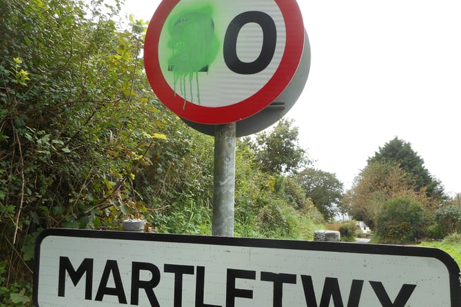 The defaced Martletwy 20mph speed limit sign