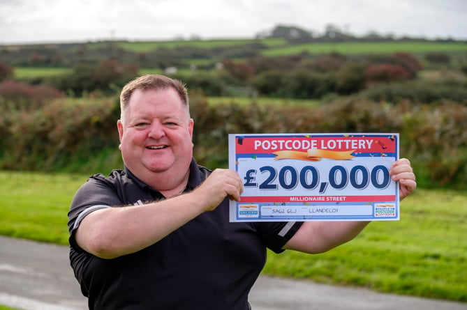 GAME-CHANGER: Alan couldn't believe his eyes when he glimpsed £200K cheque