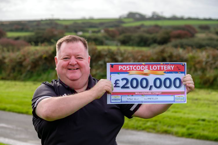 GAME-CHANGER: Alan couldn't believe his eyes when he glimpsed £200K cheque