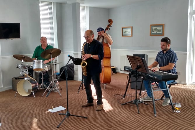 The four-member John Gibbon Trio at the Imperial Hotel, Tenby on October 4