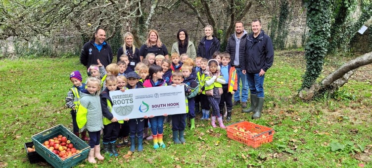 Pupils from St Francis Catholic School, Milford Haven are pictured alongside staff from the Park Authority, the Pembrokeshire Coast Charitable Trust and South Hook LNG.