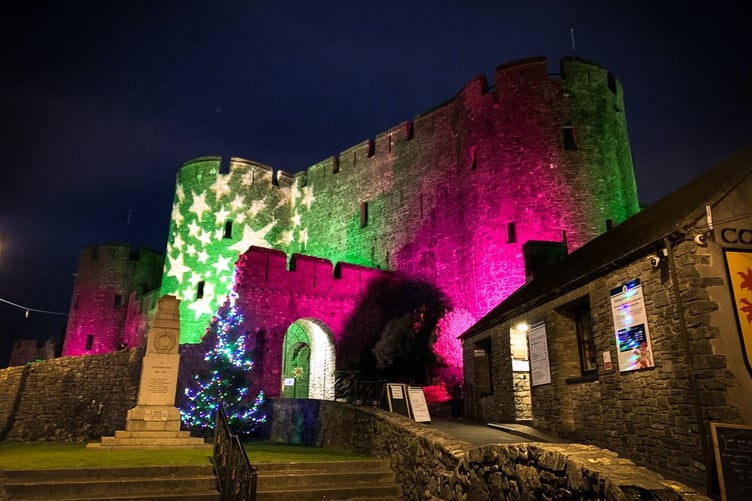 Pembroke Castle at night