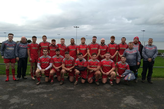 Pembroke First XV squad and coaching team.