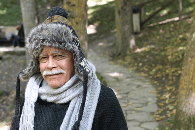 Old man with warm outdoor clothing