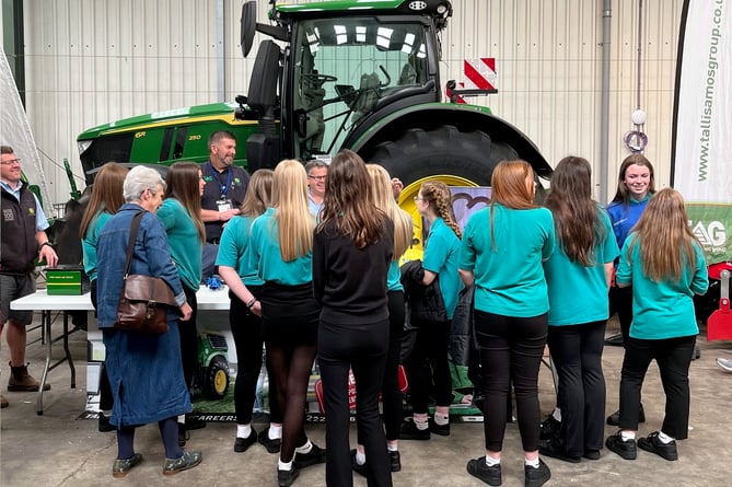 School children learning how machinery is used in food production