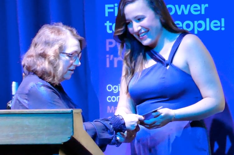 Jessica Ryder receives the Blue Light Award from Caroline Wheeler (Bevan Buckland) during the Community Kindness Awards in Tenby