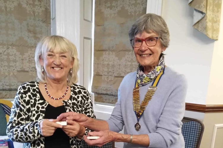 Past President Liz proceeded to officially enrol Elaine Bissenden as a new member at the November meeting of Tenby and District Inner Wheel Club.