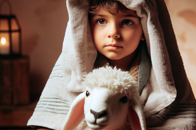 Nativity character - shepherd (with towel on head and toy sheep)