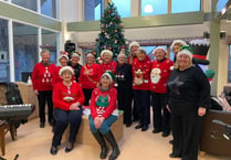 Neyland Choir ladies sing carols to retired residents at Steynton