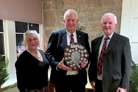 David Phillips holding the shield, with President Michael Colley and lady Chairman Elizabeth Minchin. 