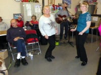 Dancing at Tenby Friendship Club Christmas afternoon tea