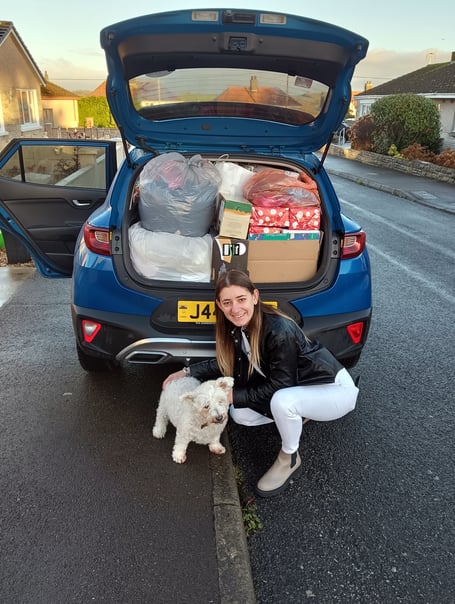Bethan Osborne with the car loaded with donations ready for the Cardiff trip
