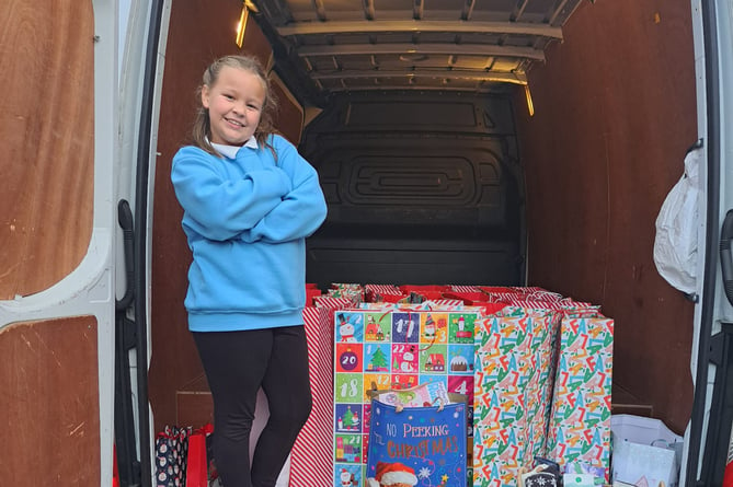Grace with her presents for Carmarthenshire families