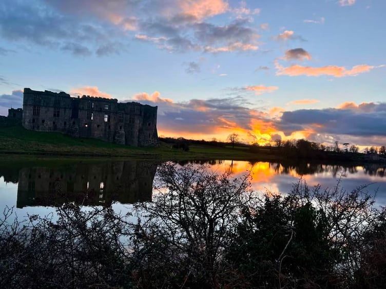 Carew Castle 'on fire' in sunset