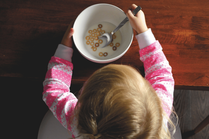 Child eating breakfast