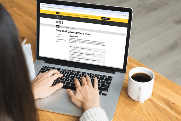 Personal Development Plan (Welsh Government BOSS website on laptop screen)