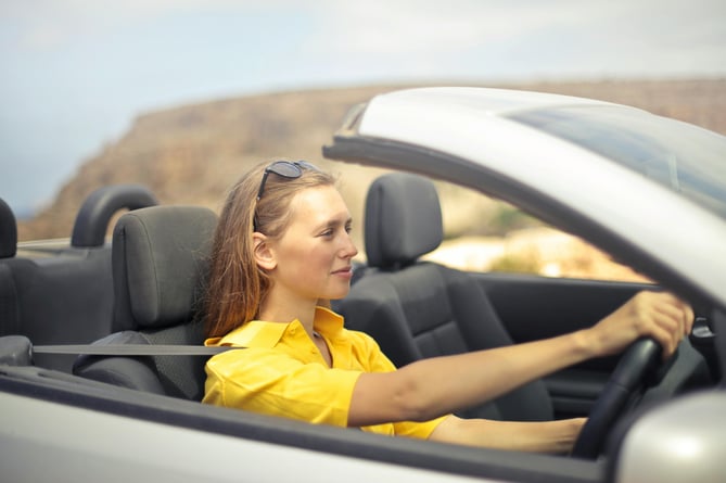 Photo by Andrea Piacquadio: https://www.pexels.com/photo/woman-in-yellow-shirt-driving-a-silver-car-787476/