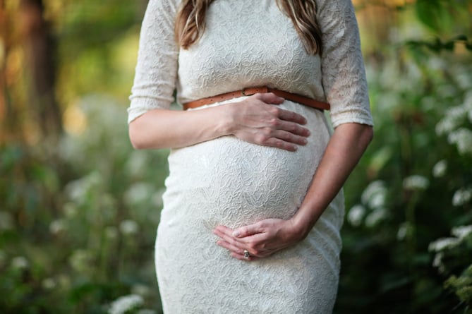 Photo by Leah Newhouse: https://www.pexels.com/photo/pregnant-woman-photoshoot-618923/