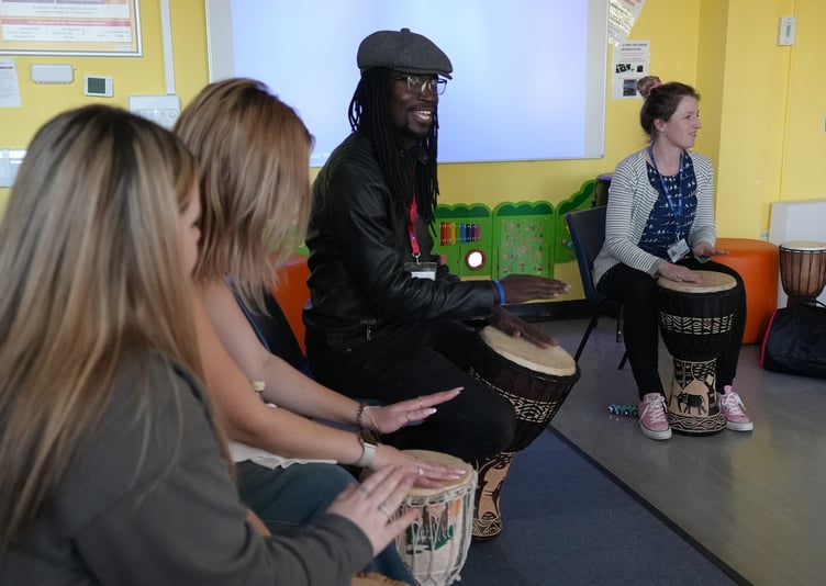 Lox with childcare learners at the drumming workshop