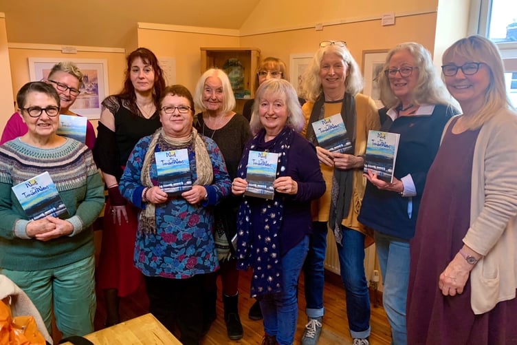 Simone Mansell Broome (centre) pictured at the launch of ‘Words on Troubled Waters’, with the nine other writers featured.